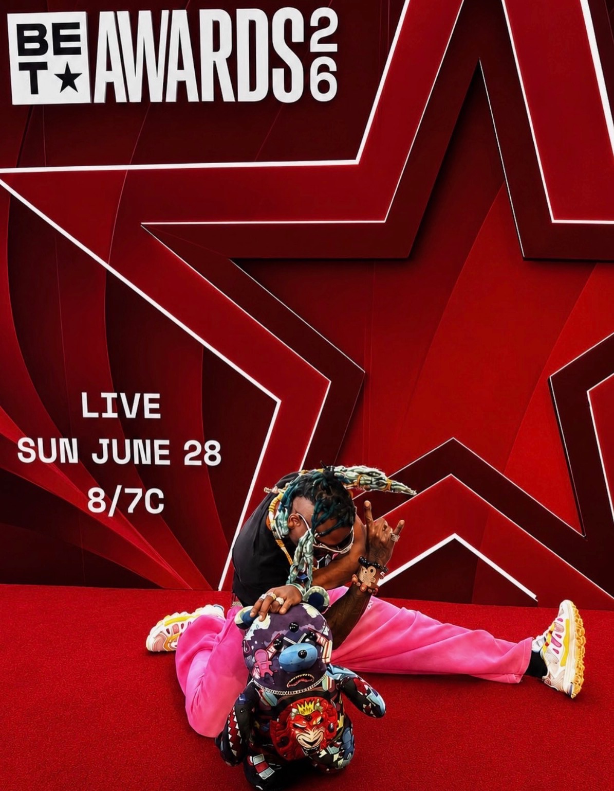 Kid Pat posing at the BET Awards 2026 red backdrop