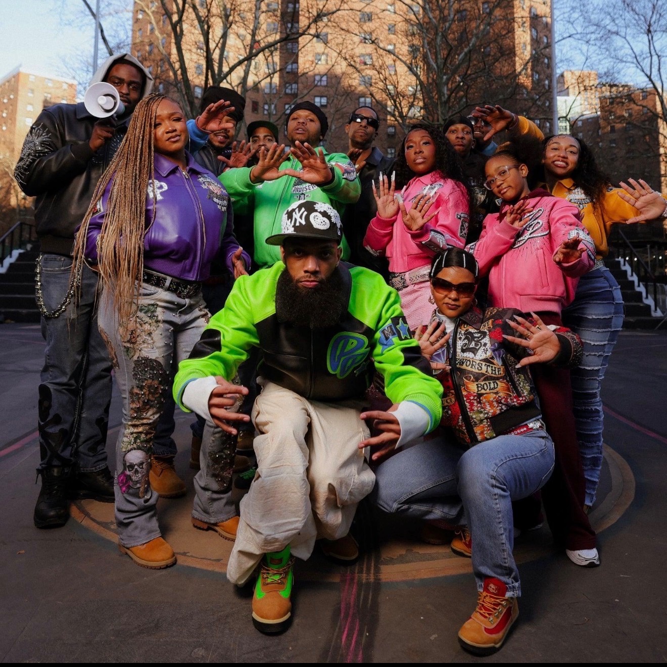 Kid Pat and Lite Feet creative family posing together outdoors in New York City