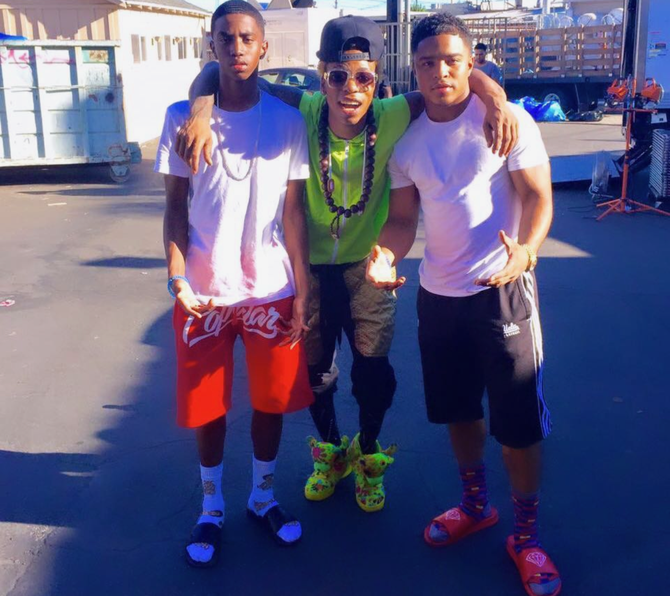 Kid Pat standing with two fellow performers during his early Lite Feet career