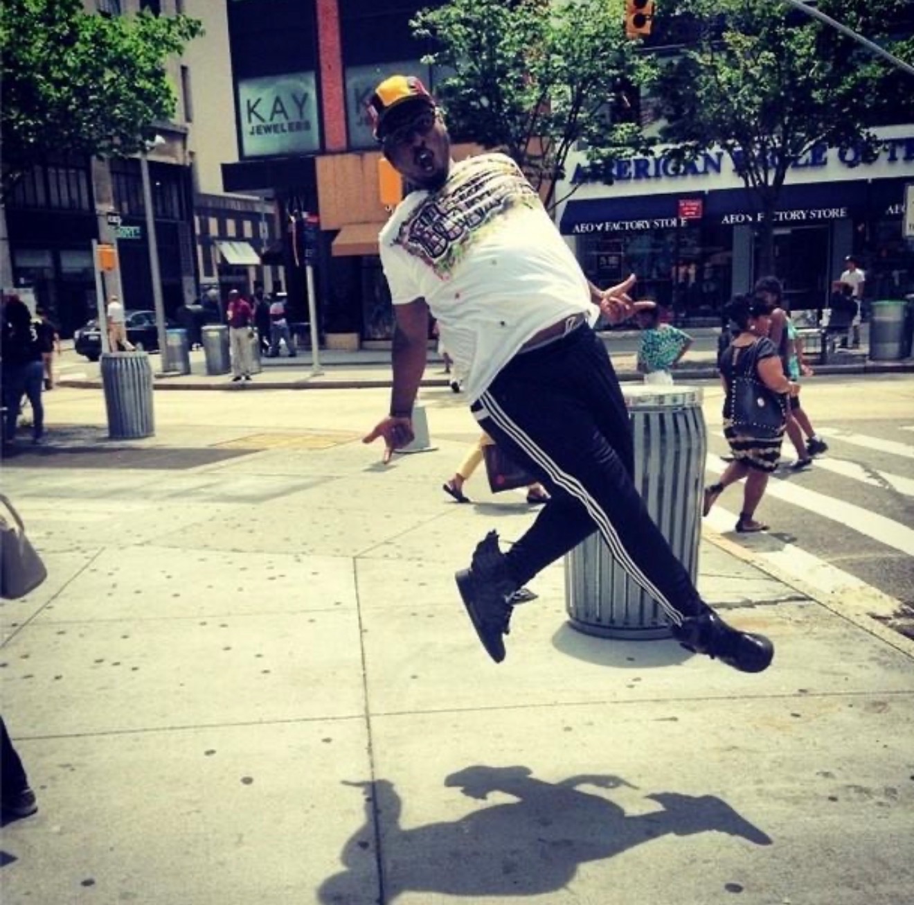 Kid Pat Ya Loopy Guyzer performing a Lite Feet jump on a New York City street