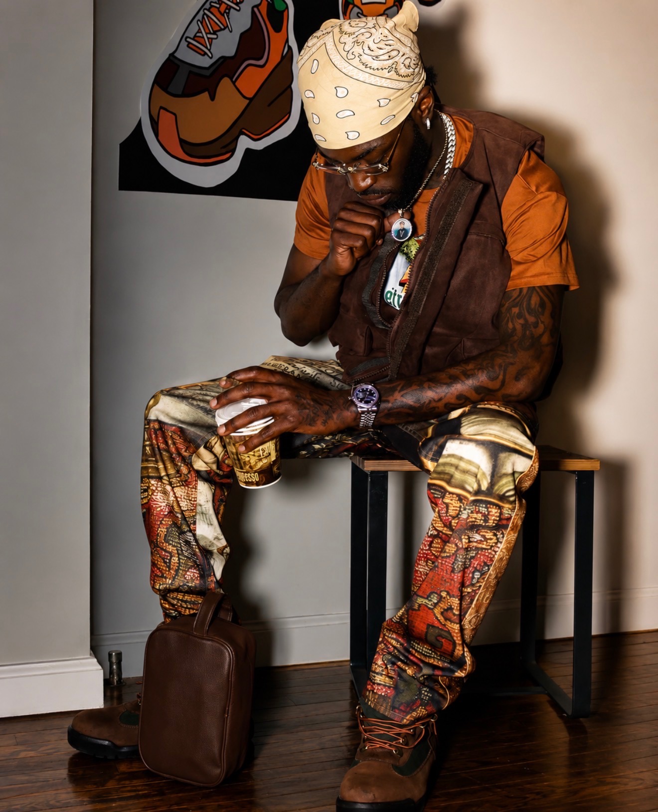 Quisy seated in an editorial portrait for The Misty TV Firm Corporation