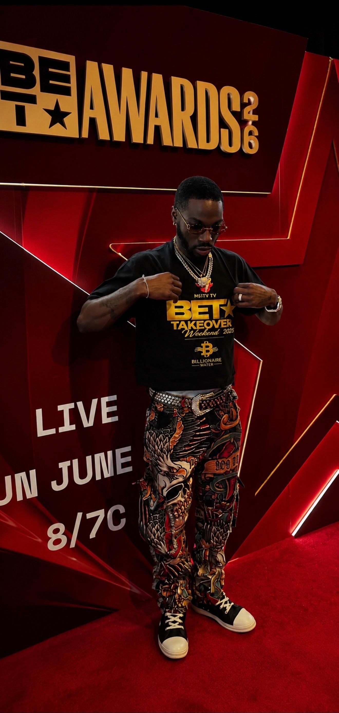 Guest portrait at the BET Awards 2026 red backdrop during The Misty TV Firm media recap