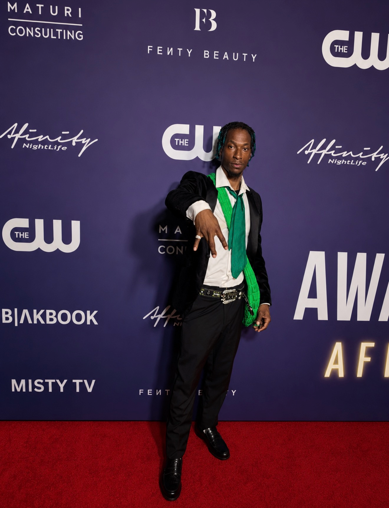 Guest portrait at the purple BET Awards afterparty backdrop during Los Angeles event coverage