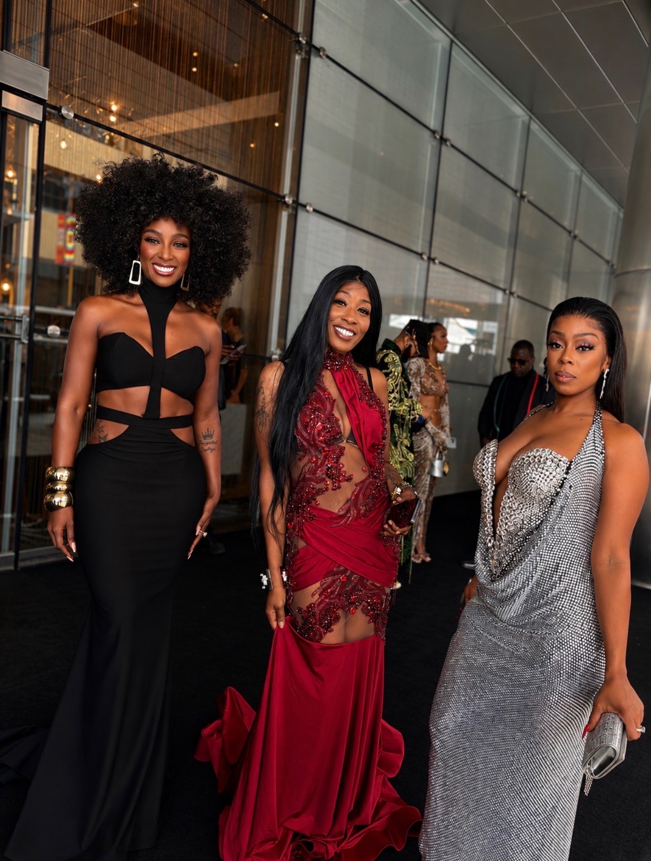 Misty Blanco with two women during BET Awards Weekend arrivals and red carpet fashion coverage